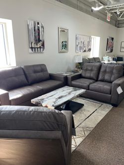 Versatile Style, high quality brown leatherette sofa w/attached backs 