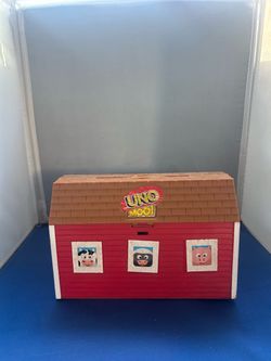 Mattel Uno Moo! Preschool Game plastic storage barn.