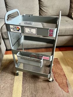 Small, gray art/craft cart