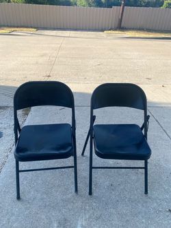2 folding chairs $15 both