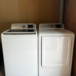Samsung washer and electric dryer set. 