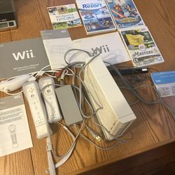 Nintendo Wii RVL-001 Home Console  Large Bundle With 2 Remotes,4 games,wii sports,Wii resort,Mario olympic winter games,Masters everything in the pict