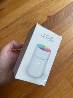 Brand New Portable Mini USB Humidifier with LED Light (White)  Brand new in box! Portable cool mist mini humidifier with colorful LED night light. Per