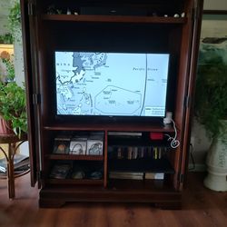 Wood entertainment armoire