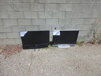 Two tvs in alley