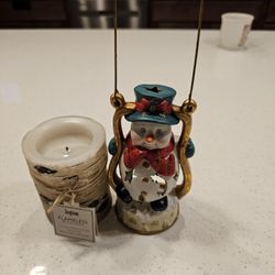 Flameless candle and Snowman voltive candle holder.