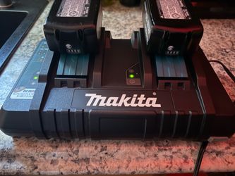 Makita 18v double charger and two 5.0 batteries.  All brand new.