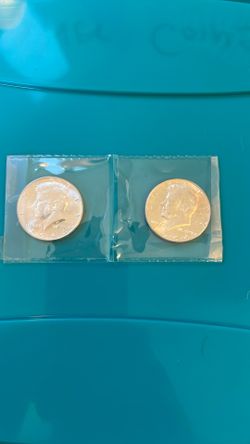 Two Uncirculated 1964 Kennedy Silver Half Dollars