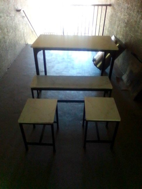 A Four Piece Marble Table