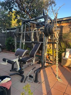 OLYMPIC SQUAT RACK SMITH MACHINE WITH OLYMPIC WEIGHTS AND BENCH