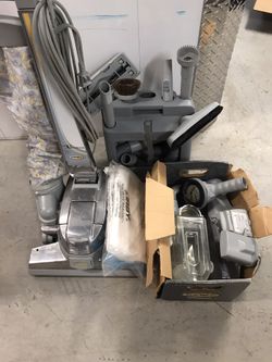 Kirby vacuum with shampooer