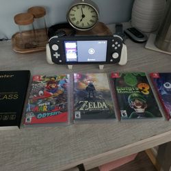 Nintendo Switch Lite + Games & Accessories (Barely Used)