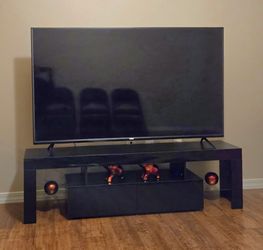 Black T.V. Stand with changing lights