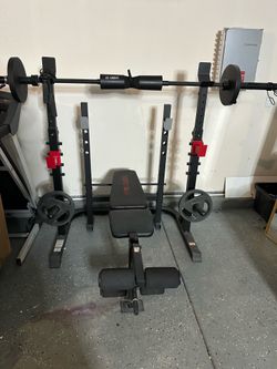 GYM SQUAT RACK WHIT BARBELL AND WEIGHT
