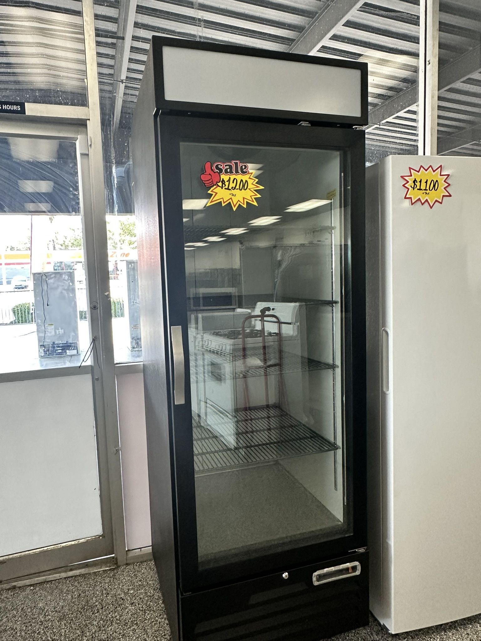 BRAND NEW BLACK KUTANO MERCHANDISER REFRIGERATOR.