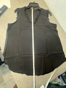 New black blouse, large size $10