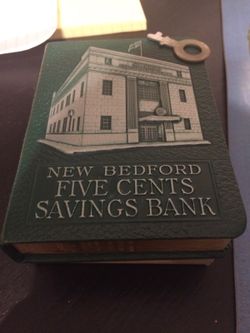 Vintage New Bedford savings bank with key