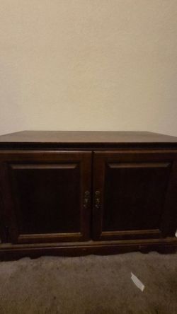 Dark Wood Three-Door Cabinet