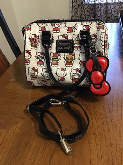 Loungefly hello kitty purse with string bag like new for Sale in