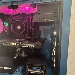 Pc And Two Keyboards And A Mouse 