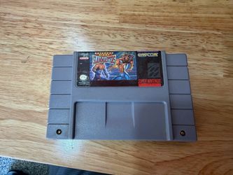 Saturday Night Slam Masters Super Nintendo SNES Capcom 1994 Wrestling Tested VTG  The product is a Nintendo SNES cartridge of Saturday Night Slam Mast