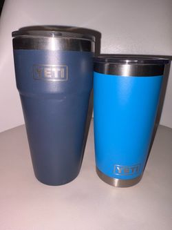 Two Yeti cups