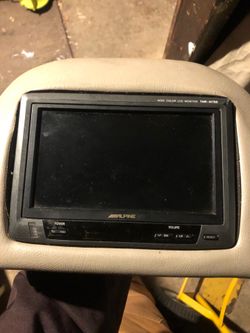 2 Alpine  Chevy or GMC headrest tvs with the modules and wiring.