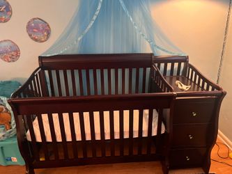 Dark wood crib