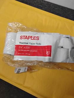 2 Staples thermal paper rolls designed for point-of-sale (POS) and credit card printers.