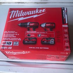 Milwaukee Impact And Drill Driver Combo 2 Batteries And Charger