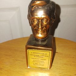 A Reproduction of Abraham Lincoln in Sapphire Bust, copyright 1958 by Kazanjian Foundation.