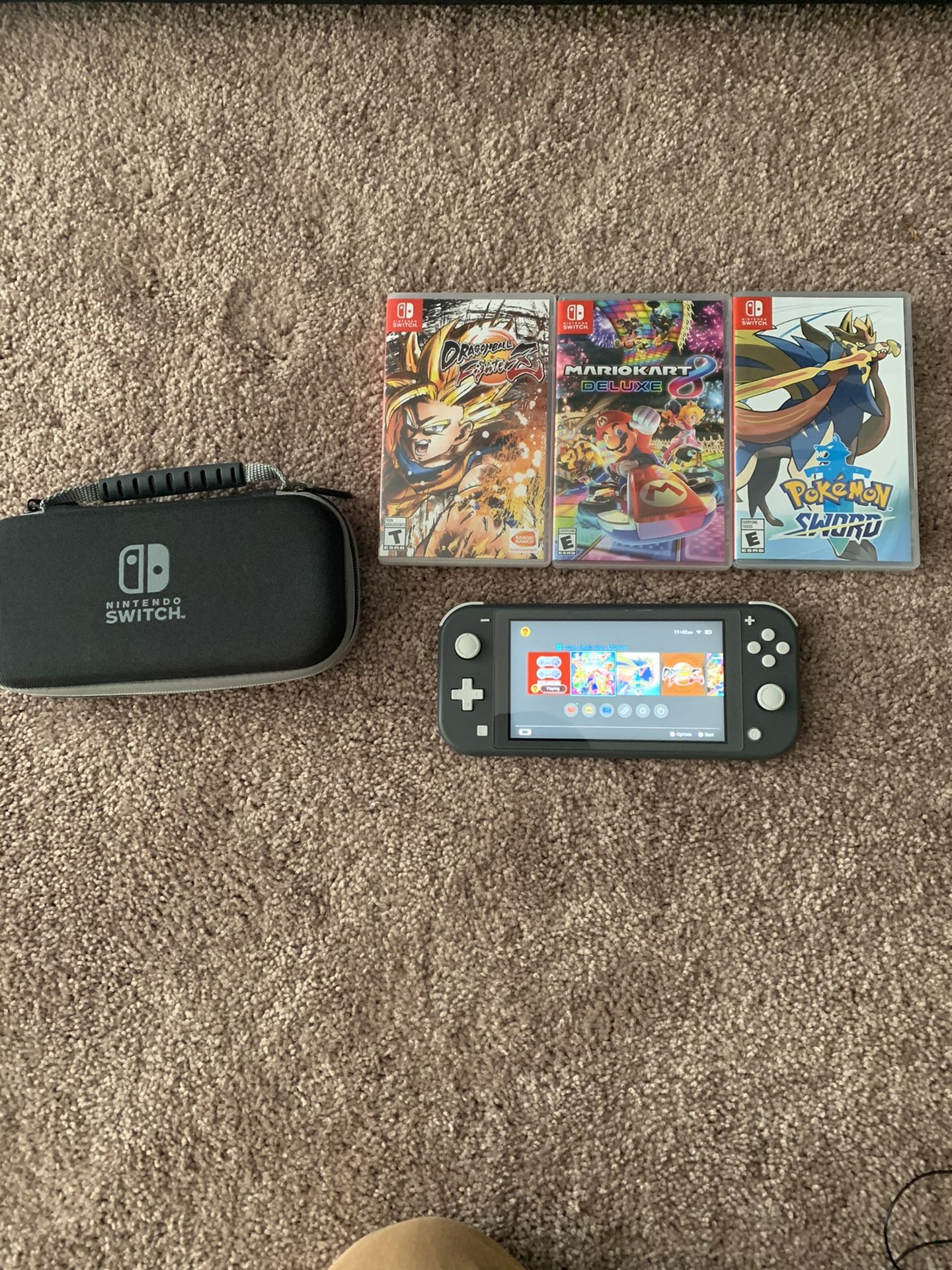 Nintendo Switch Lite W/ 4 Games And More