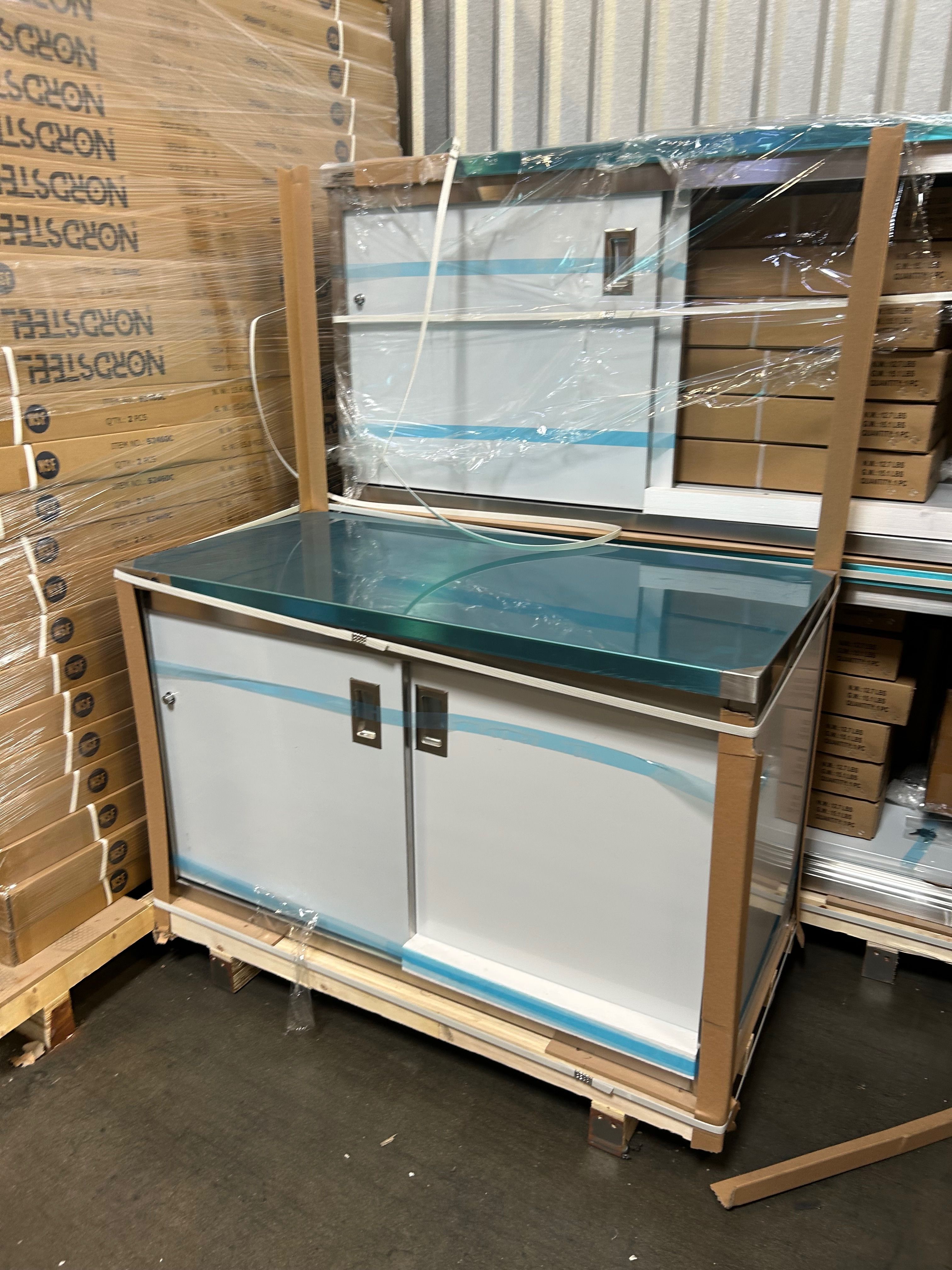 Brand new stainless steel cabinets with work top and storage