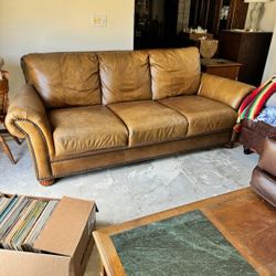 Leather high reclined back couch