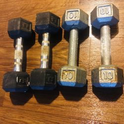 Two Sets Of Weights  10 Lbs And  8 Lbs