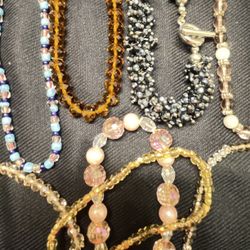 8 Crystal & Glass Bead Bracelets. 