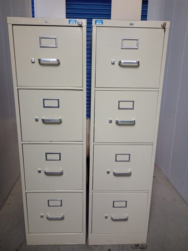 15 W -- 27 1/2  -- 52 Tall .  Metal File Cabinet With Key 