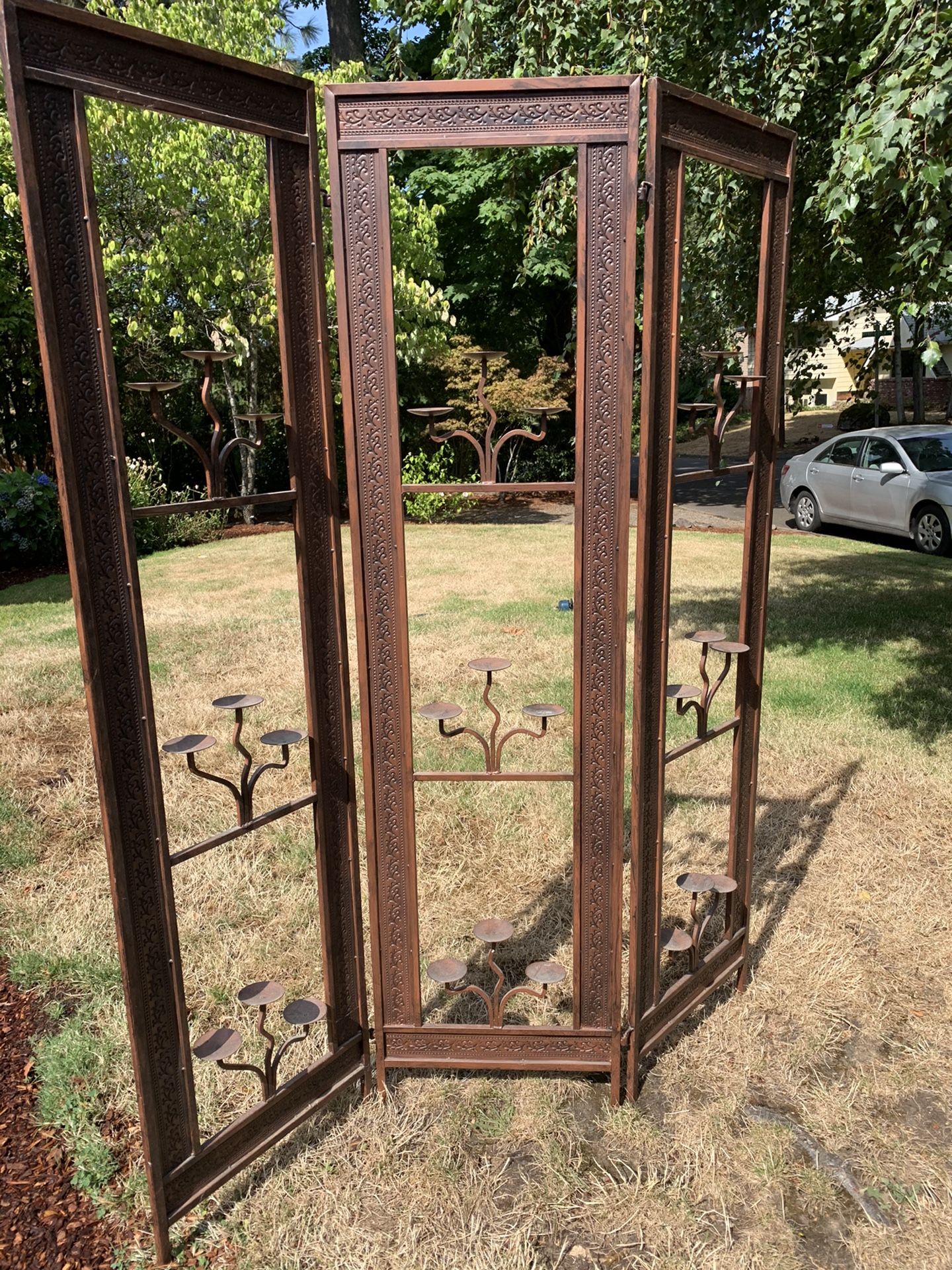 Trifold decorative candle room divider. Each panel is 70” High x 18