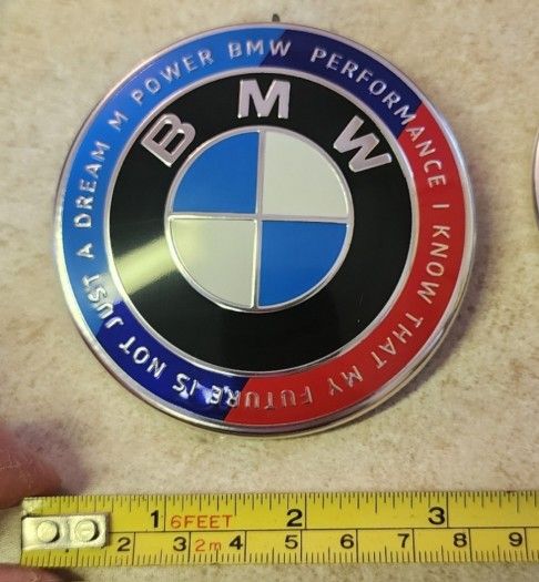 BMW 50th Anniversary Badge Emblem For Hood Or Trunk. SEE ALL PICS FOR DOOR LIGHTS, RIM CAPS, SEAT BELT PADS ETC! SOLD SEPARATELY.  SHIPPING AVAILABLE 