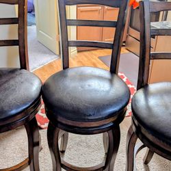 Three Revolving Dining Chairs