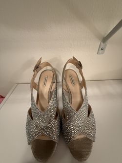 High heeled, crisscross, silver open toe sling backs
