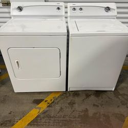 Kenmore-top load washer and electric dryer set.