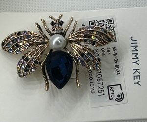 Jimmy Key blue & gold bee brooch .$30.