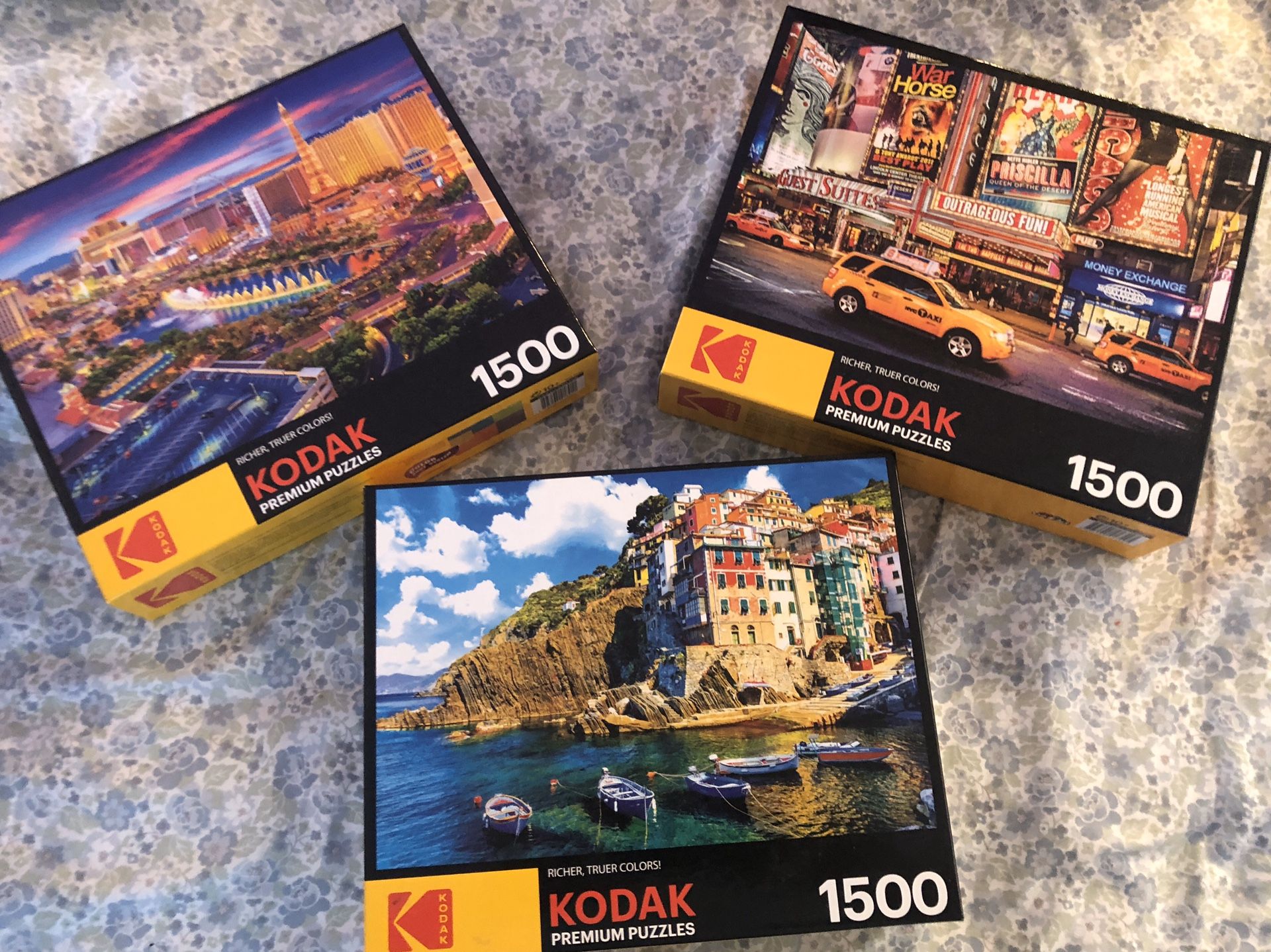 3-Kodak 1500 piece puzzles