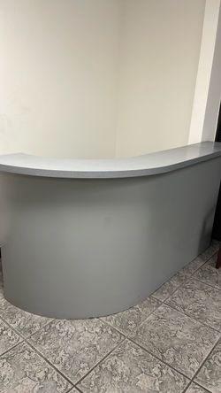 Gray Curved Reception Desk