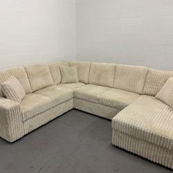 large, U-shaped sectional sofa  Cream Color 