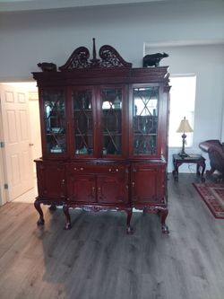 Chippendale-style mahogany breakfront china cabinet