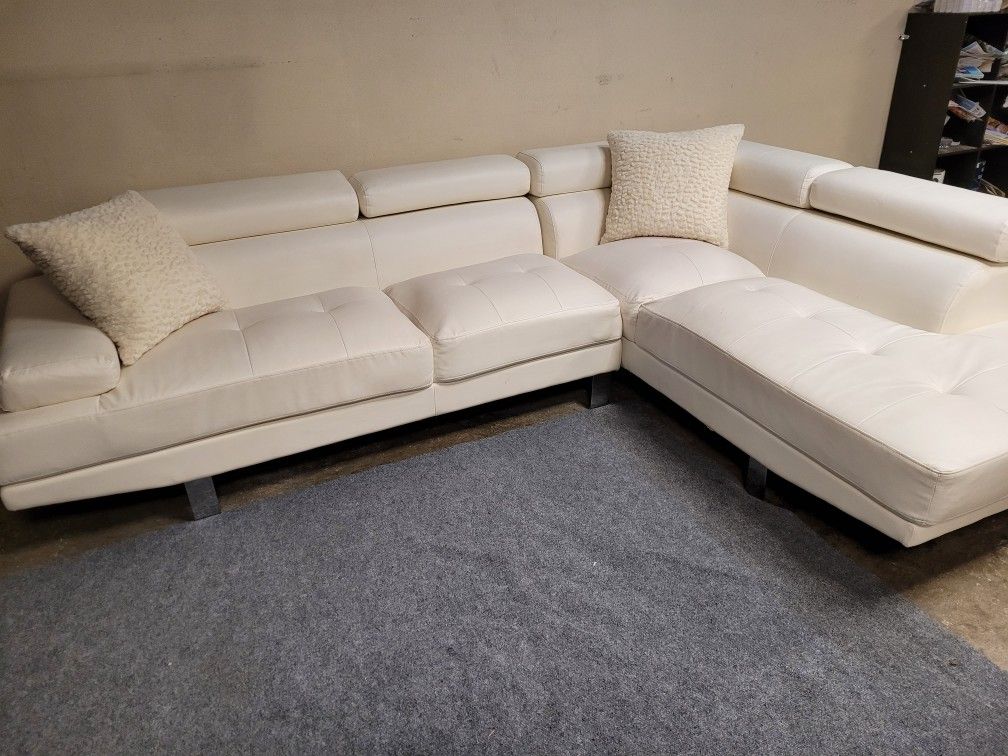 Beautiful white leather sectional couch