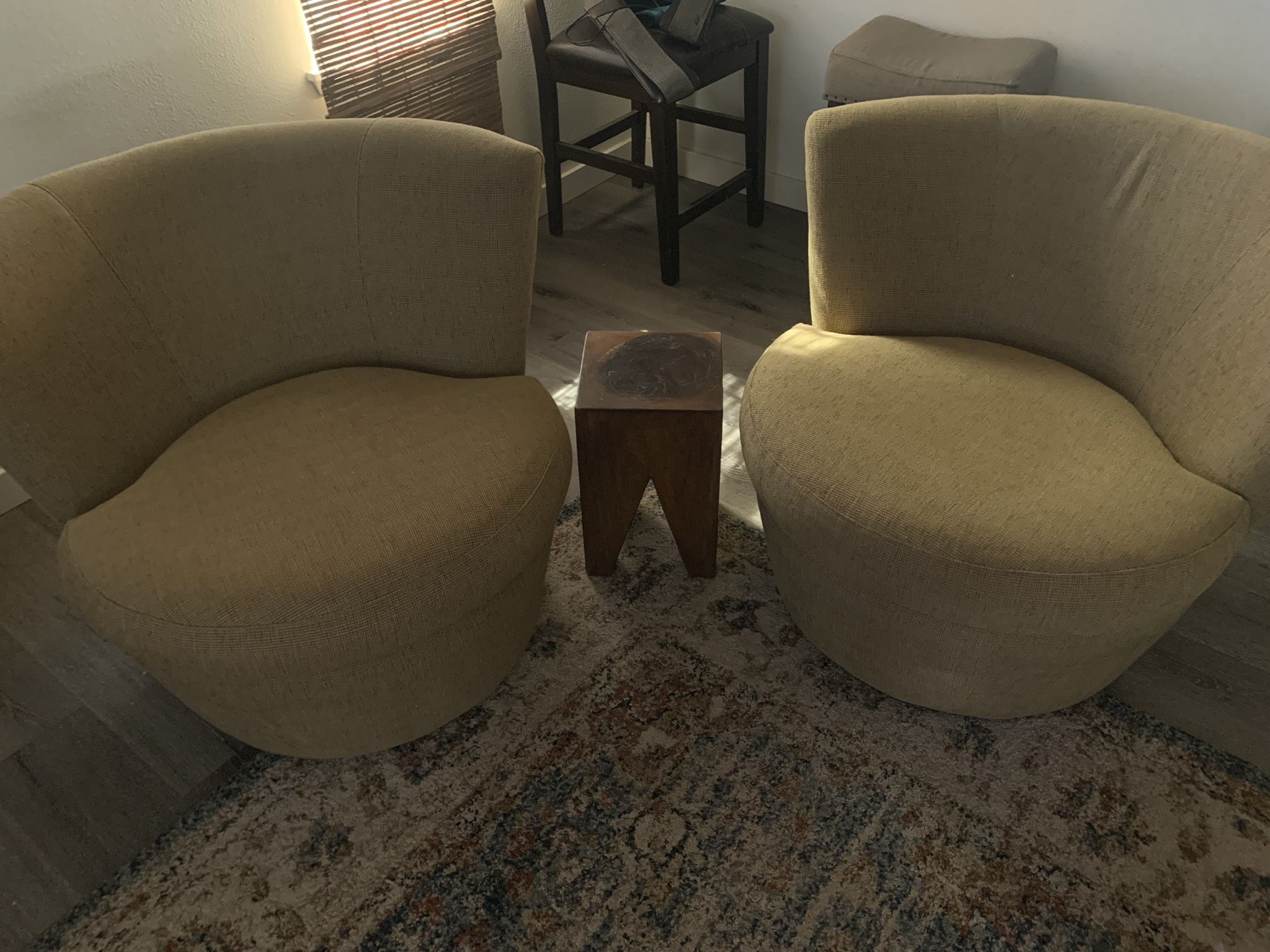Two Swivel Chairs