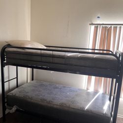 $100.00 Twin Iron Bunk Bed